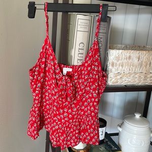 Red tank with blue and white flowers